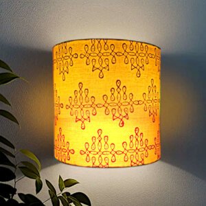 Half round wall lamp shade with traditional kolam design