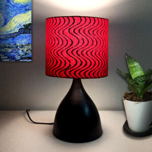 Bed side table lamp with red lamp shade