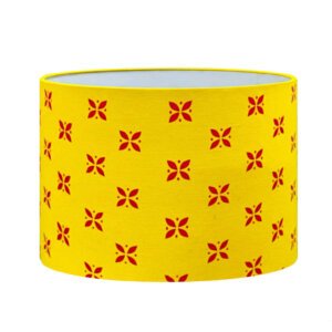 Table lamp shades in printed fabric | Drum shade with red motif on light orange fabric